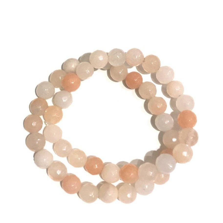 Adventurine Natural Gemstone Stretch Bracelets on a white background showng the variety of hues and textures - L'Atelier Global