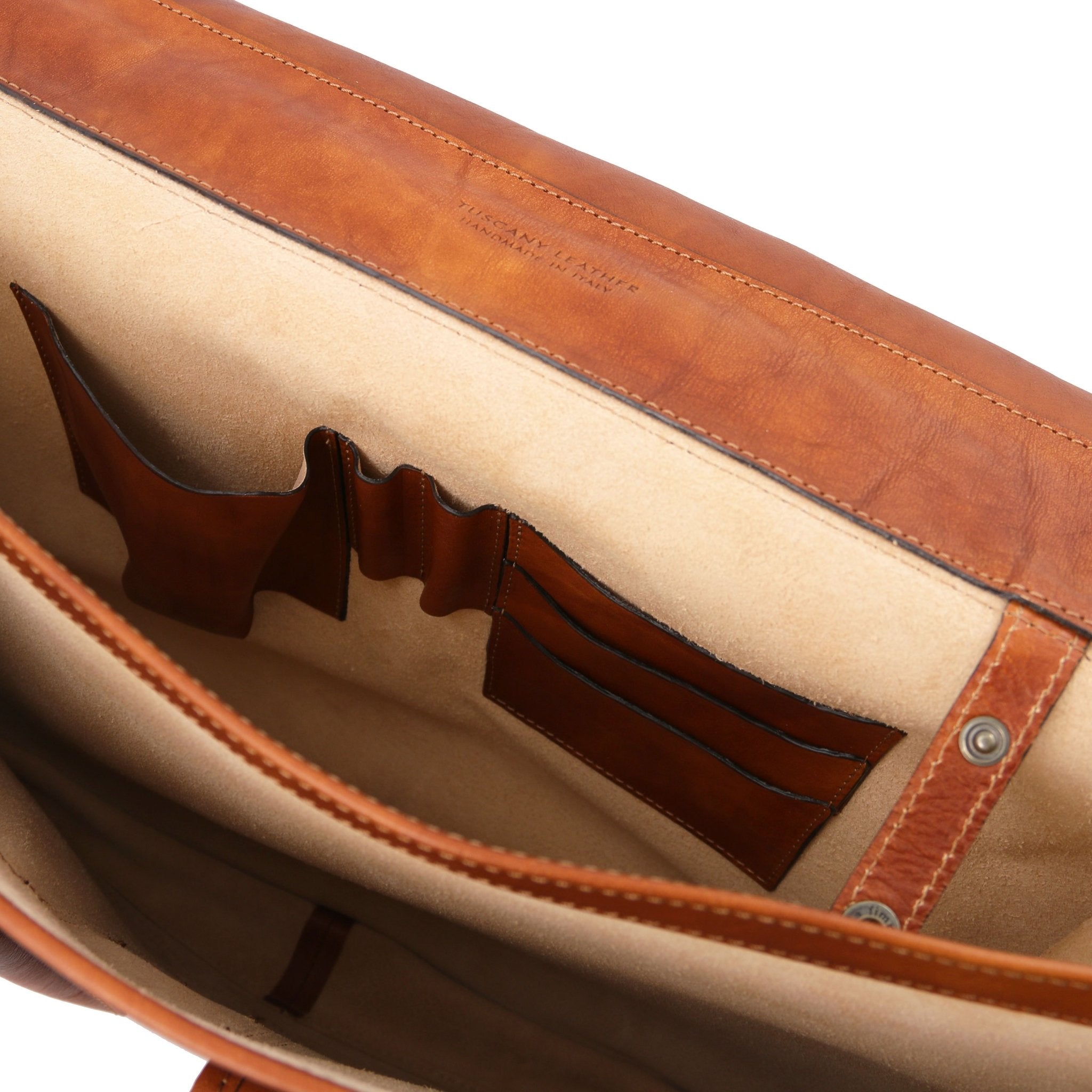 Interior View of the Ancona Leather Messenger Bag in Natural Showing the Open Pockets