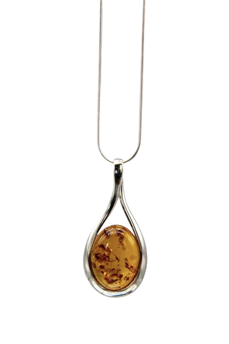 Baltic Honey Amber Sculptured Tear Drop Necklace on a white background  - L'Atelier Global