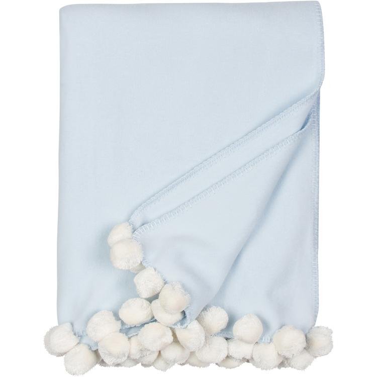 Bamboo Luxxe Pom Pom Throw in baby blue with white pom poms folded on a white background - L'Atelier Global