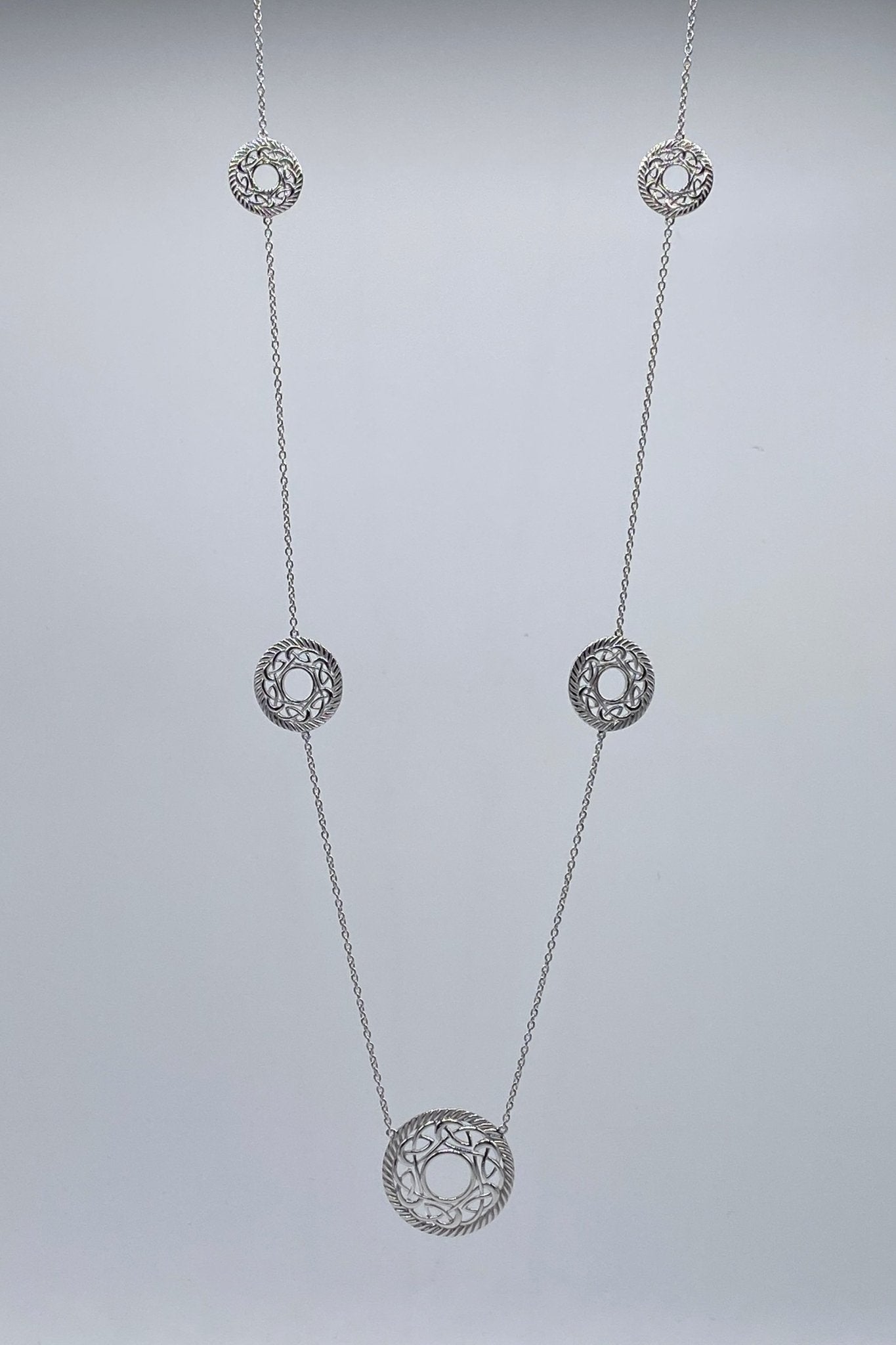 Everlasting Love Sterling Silver Necklace on a gray background - L'Atelier Global