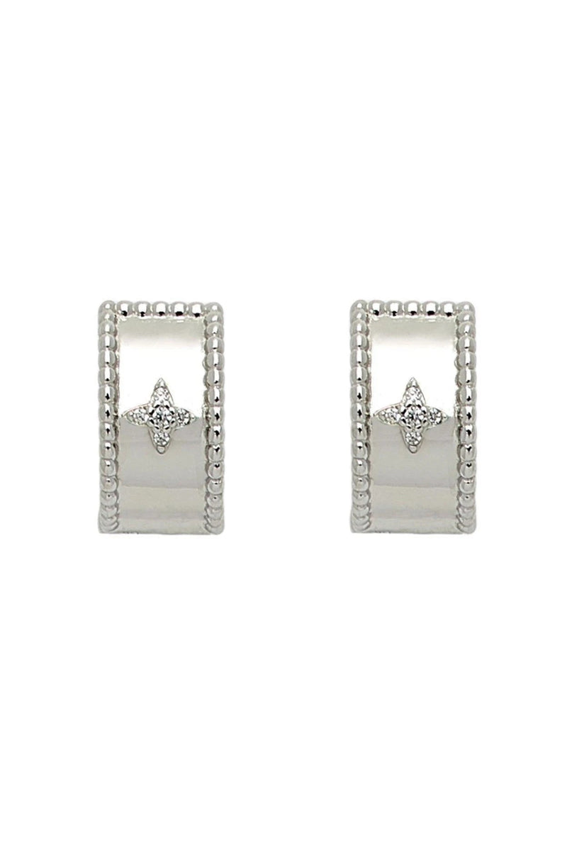 Firenze Cuff Star Earrings in silver on a white background. The vintage diamond star shape is seen in the front of the hoop.