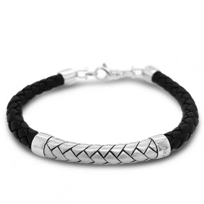Irish Herringbone Cord Sterling Silver Bracelet on a white background showing the herringbone metal and leather.