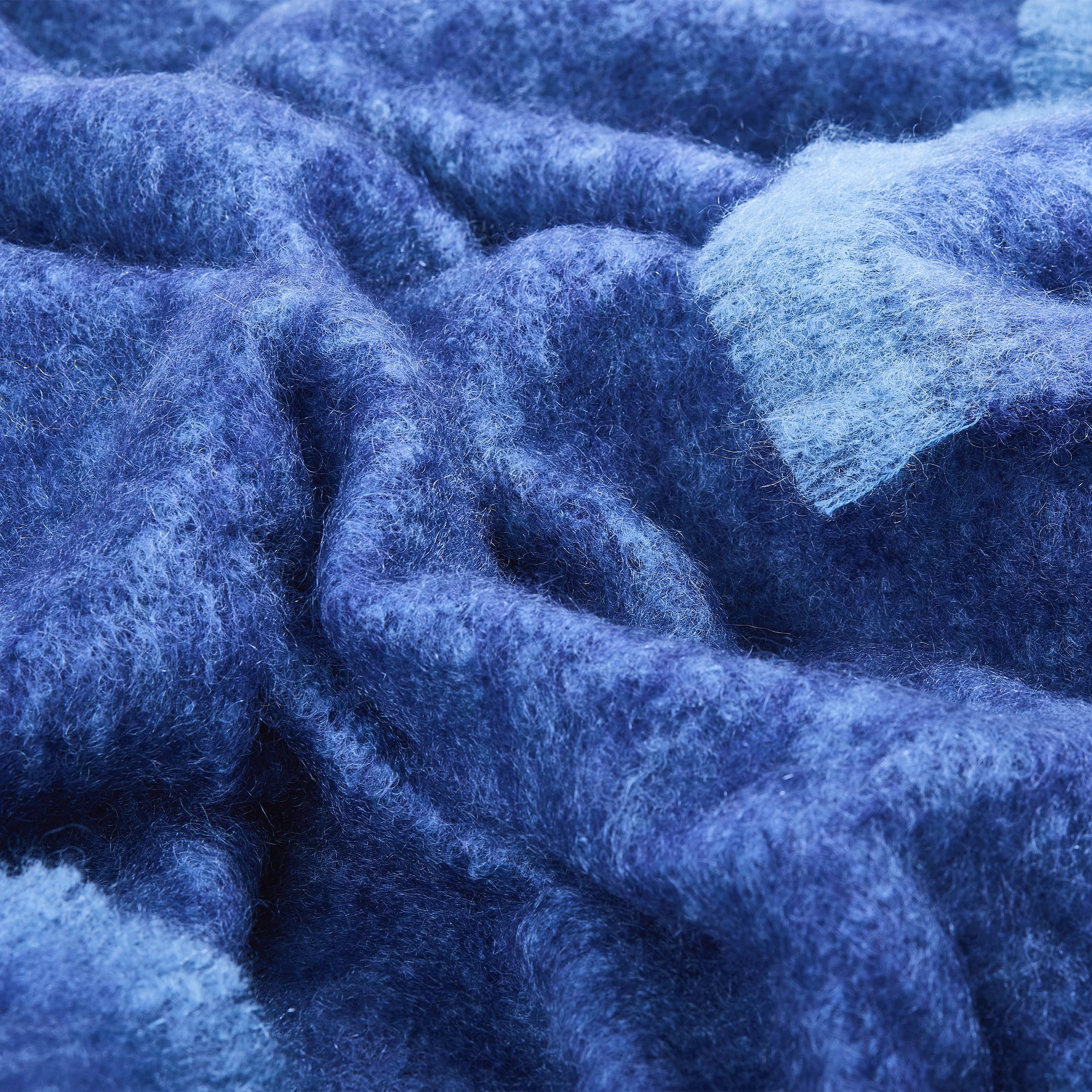 Close up fabric view Irish Kilkenny Navy Melange with soft blue trim Handloomed Plush Mohair Throw - L'Atelier Global