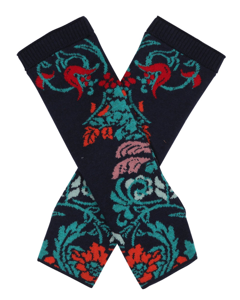 Lily of The Valley Serbian Fingerless Gloves in Blue laying crossesd over each other on a white background