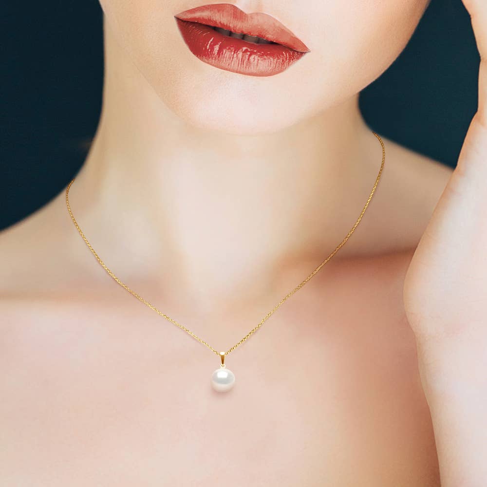 Lustrous Yellow Gold Freshwater Pearl Broom Pendant on model showing gold chain