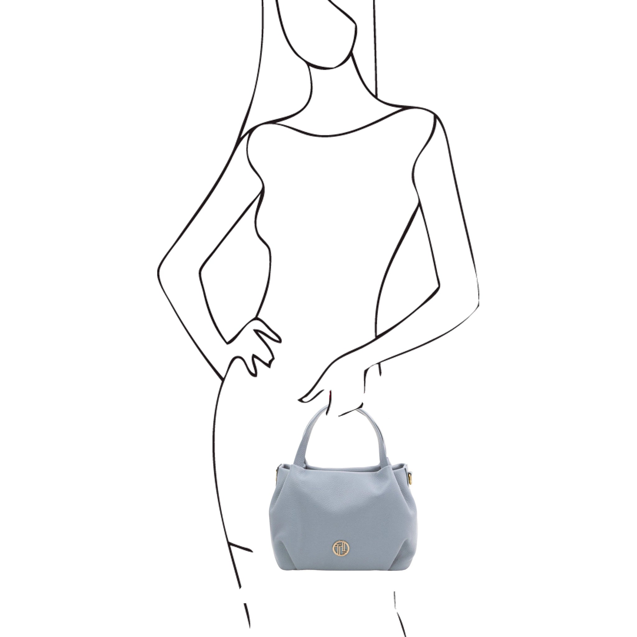 Black and white sketch of woman holding the Nora Soft Italian Leather Shoulder Bag in Light Blue