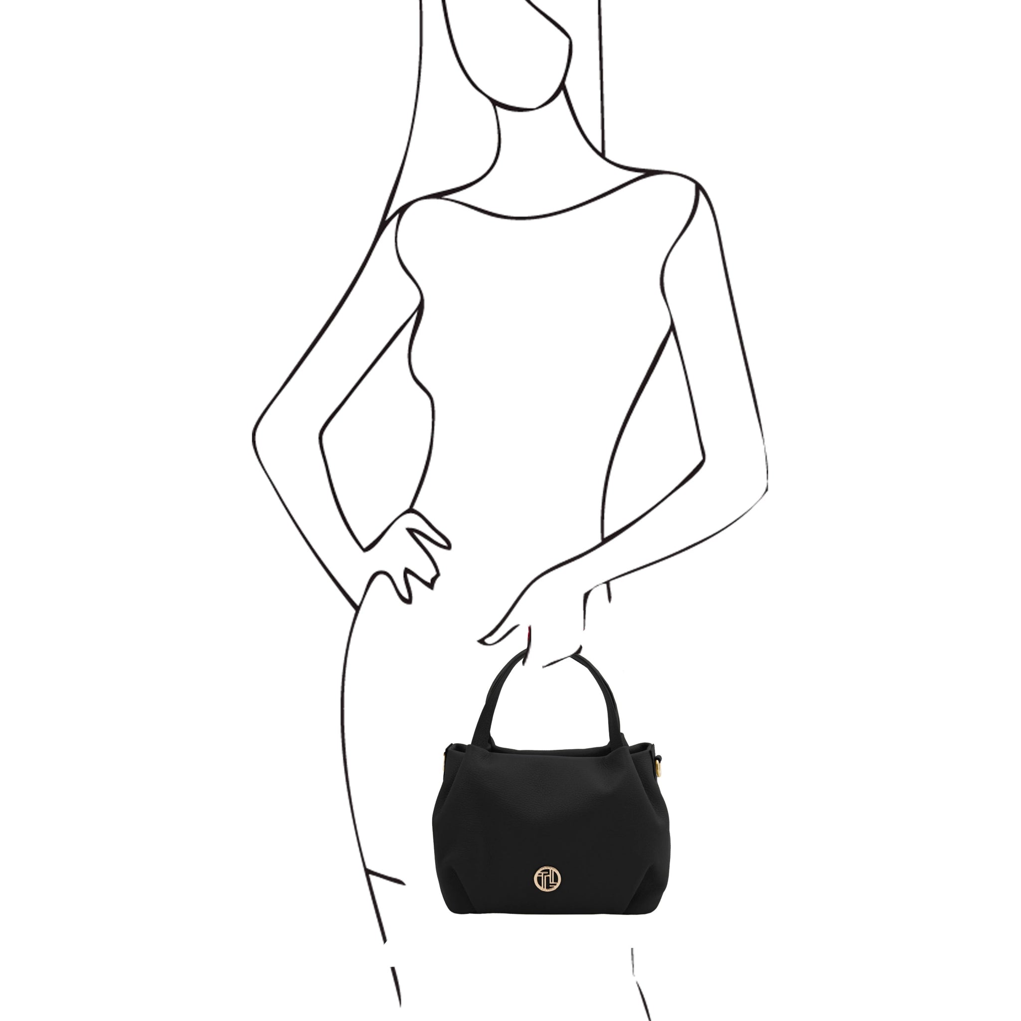 Black and white sketch of woman holding the Nora Soft Italian Leather Shoulder Bag in Black