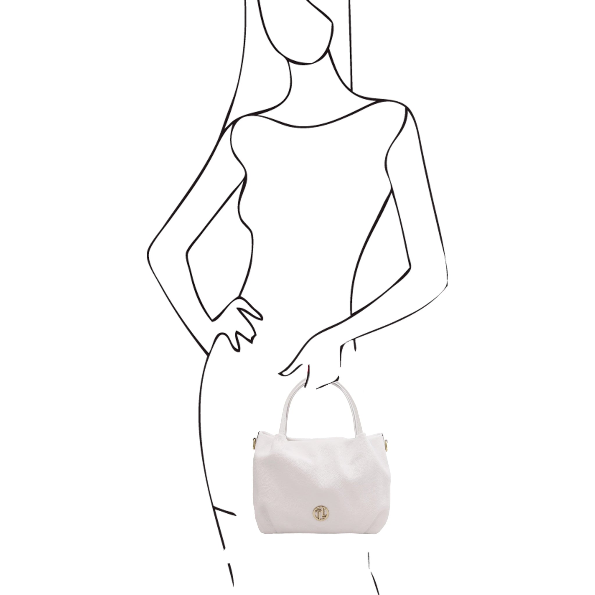 Black and white sketch of woman holding the Nora Soft Italian Leather Shoulder Bag in White