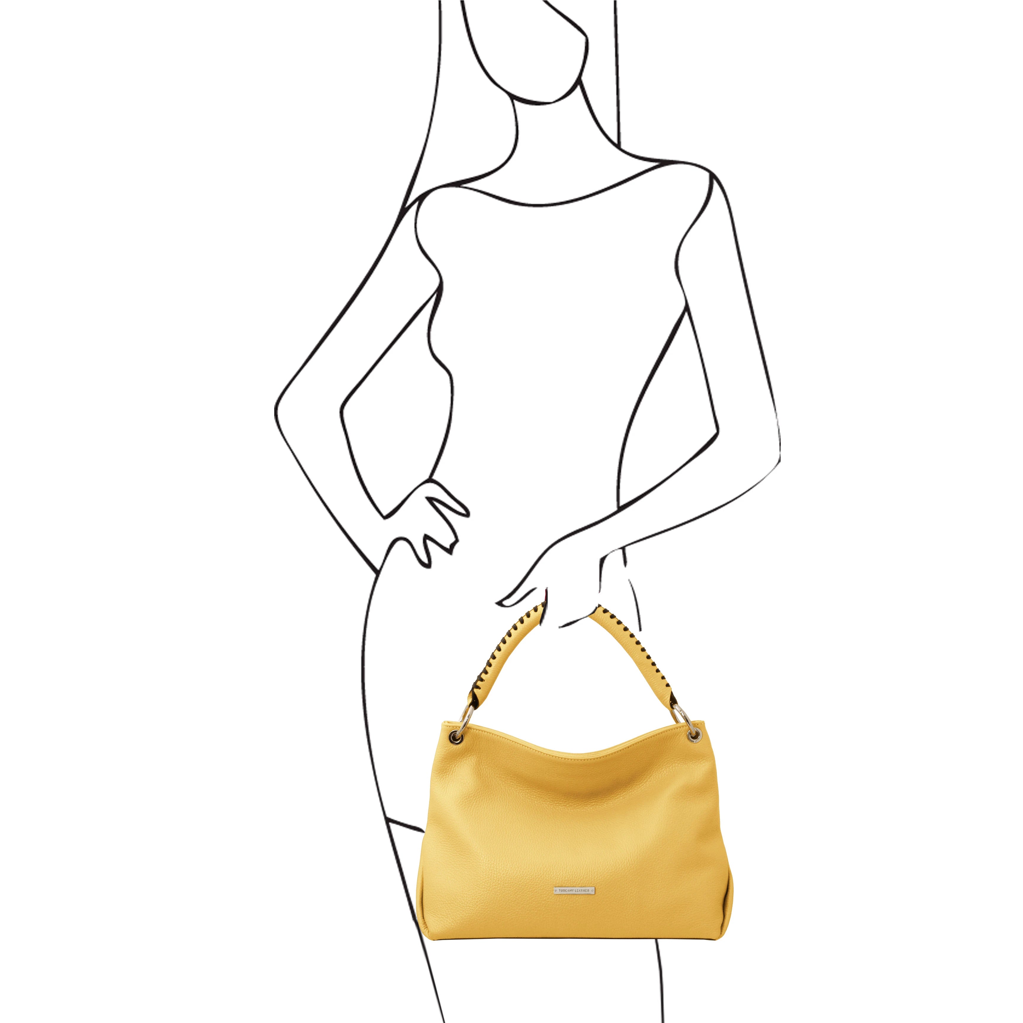 A sketch of a female model holding the TL Bag Soft Leather Handbag in Yellow on a white background - L'Atelier Global