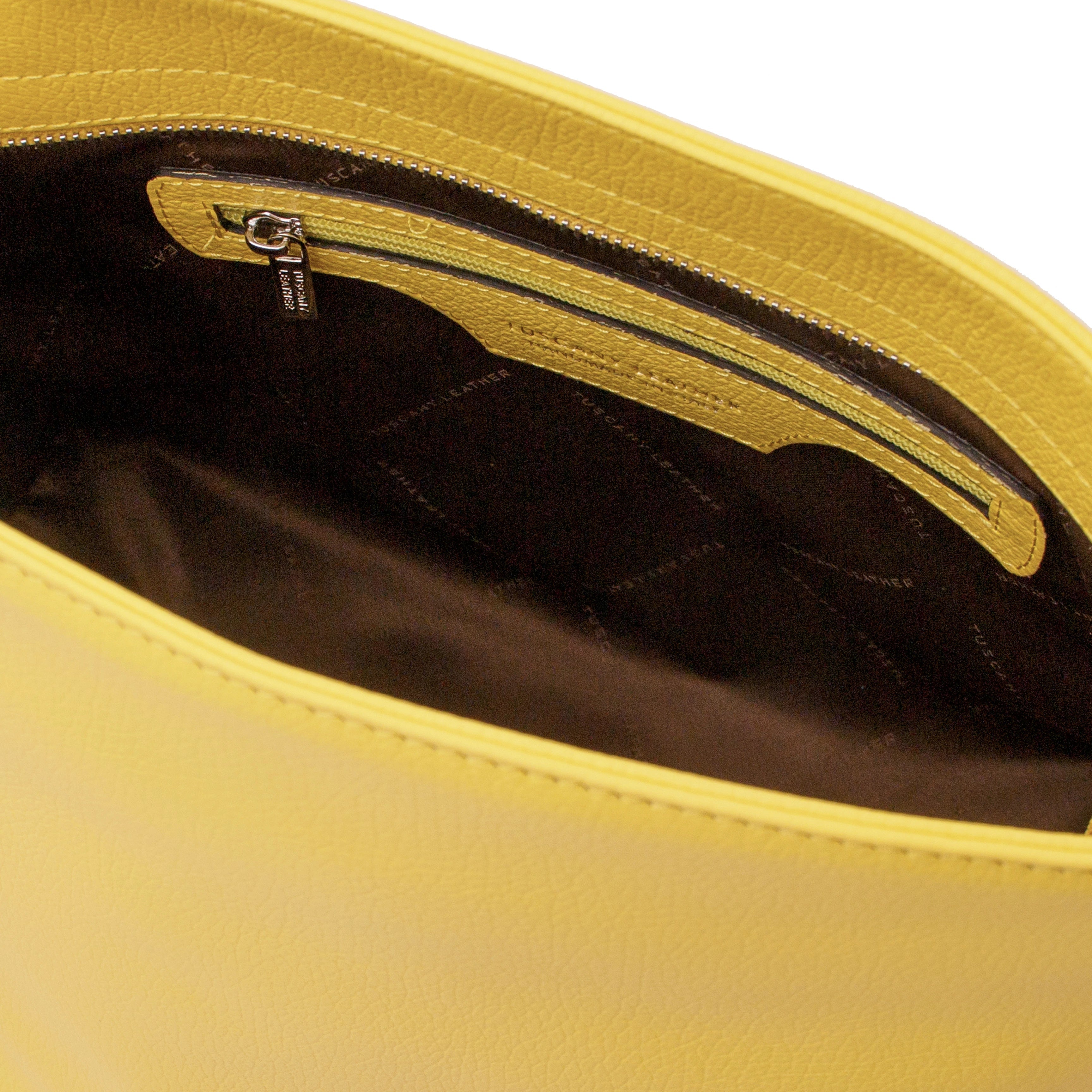 Interior view of the TL Bag Soft Leather Handbag in Yellow showing a zippered pockets on white background - L'Atelier Global