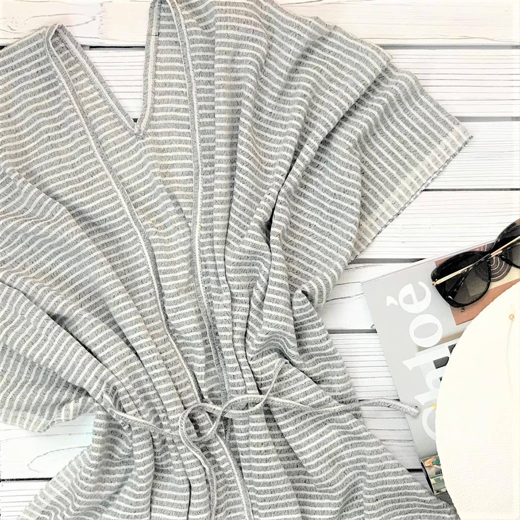 Turkish Aegean Cotton Striped Kimono in Black laying on a white deck with beach bag and Vogue magazine - L'Atelier Global