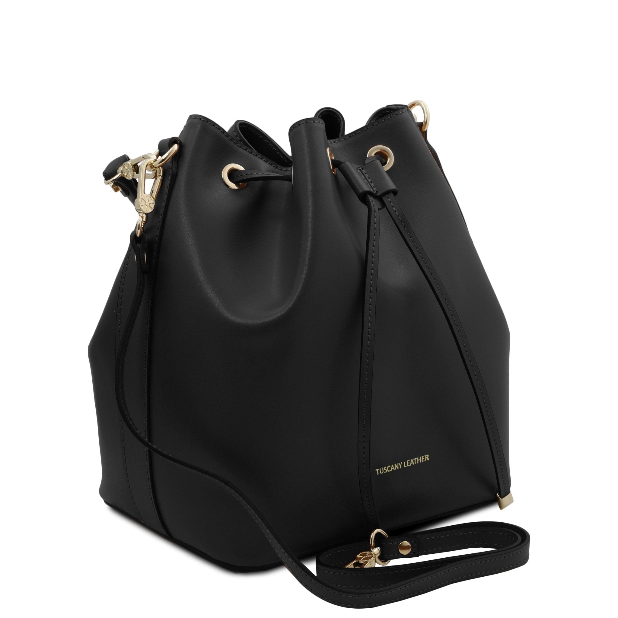 Side view of Vittoria Leather Bucket Bag in black with removable shoulder strap on a white background - L'Atelier Global